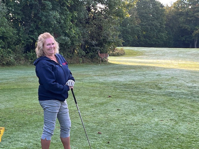 golf pic with deer